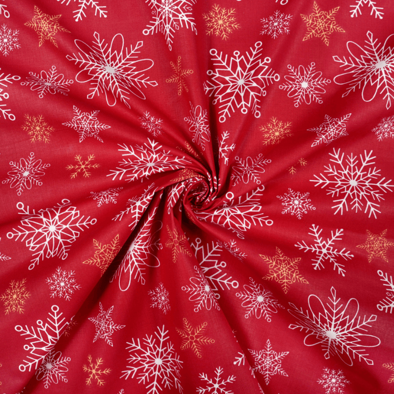 Cotton fabric 160cm | 130g/m² – snowflakes on a red background