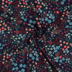 Viscose fabric 140cm | 110g/m² – flowers on a dark blue background