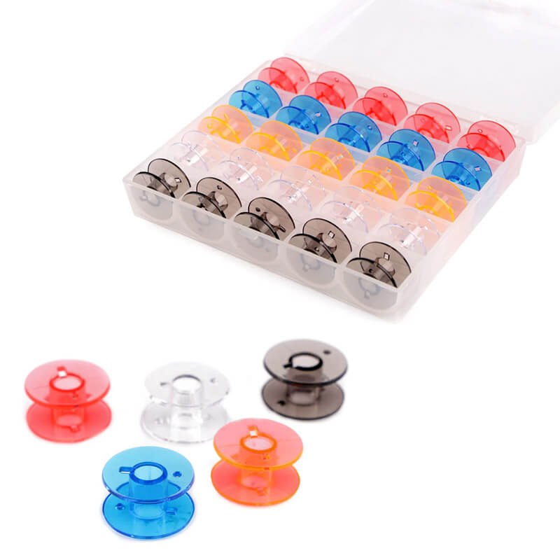 Box with 25 sewing machine thread spools.