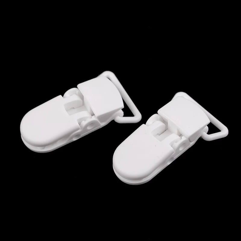 Plastic clip for pacifiers