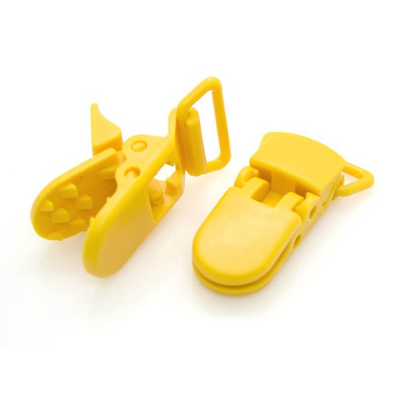 Plastic clip for pacifiers
