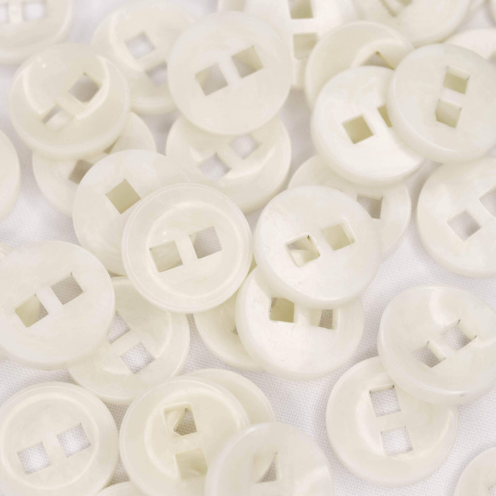 Plastmasas poga Ø22mm - piena balta