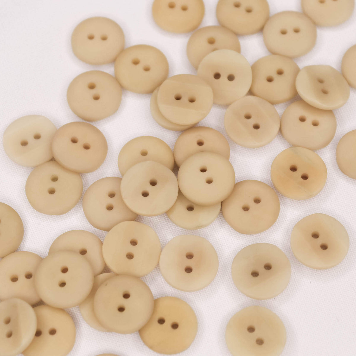 Plastmasas poga Ø15mm - bēša