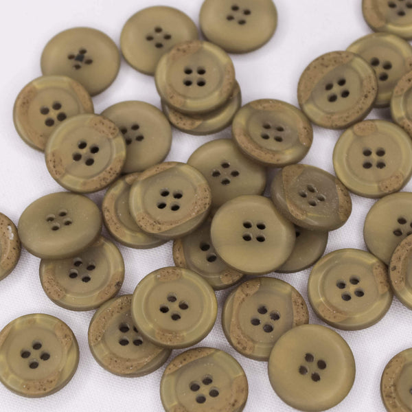 Plastmasas poga Ø18mm - bēša ar rakstu