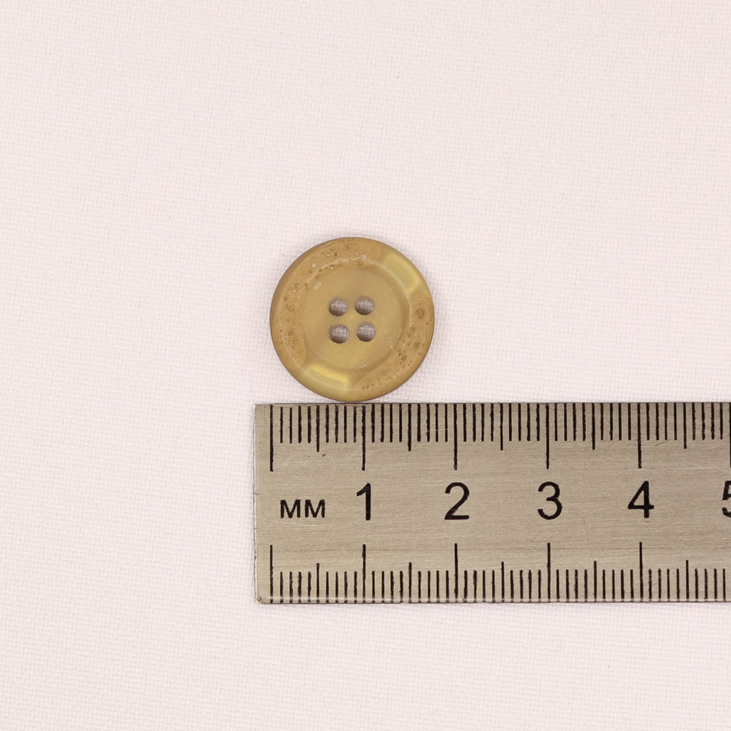 Plastmasas poga Ø18mm - bēša ar rakstu