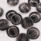 Plastmasas poga Ø28mm - pelēka, raiba