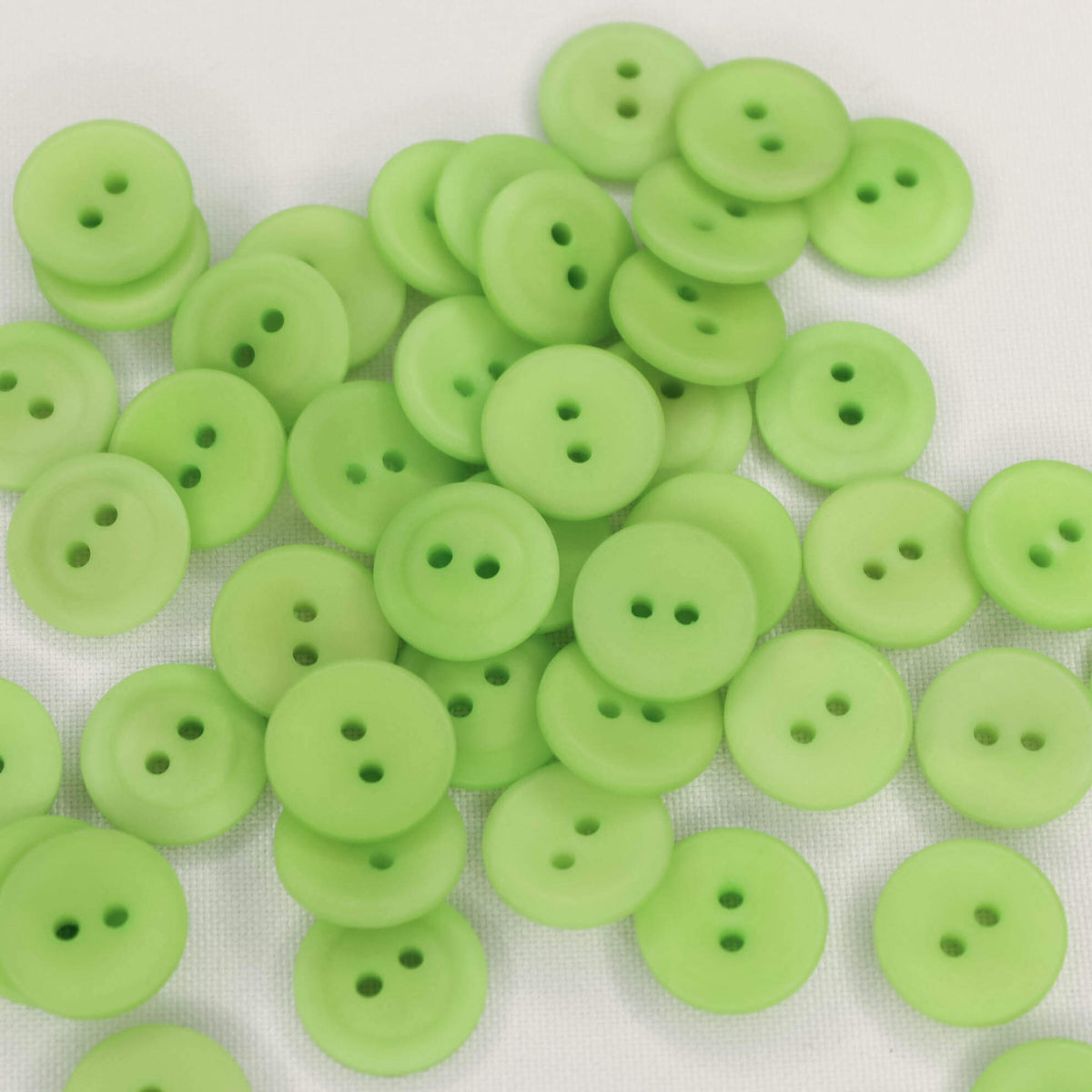 Plastmasas poga Ø15mm - gaiši zaļa