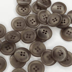 Plastmasas poga Ø20mm - caurspīdīgi pelēka