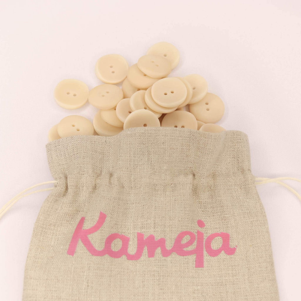 Plastmasas poga Ø22mm - krēmkrāsā