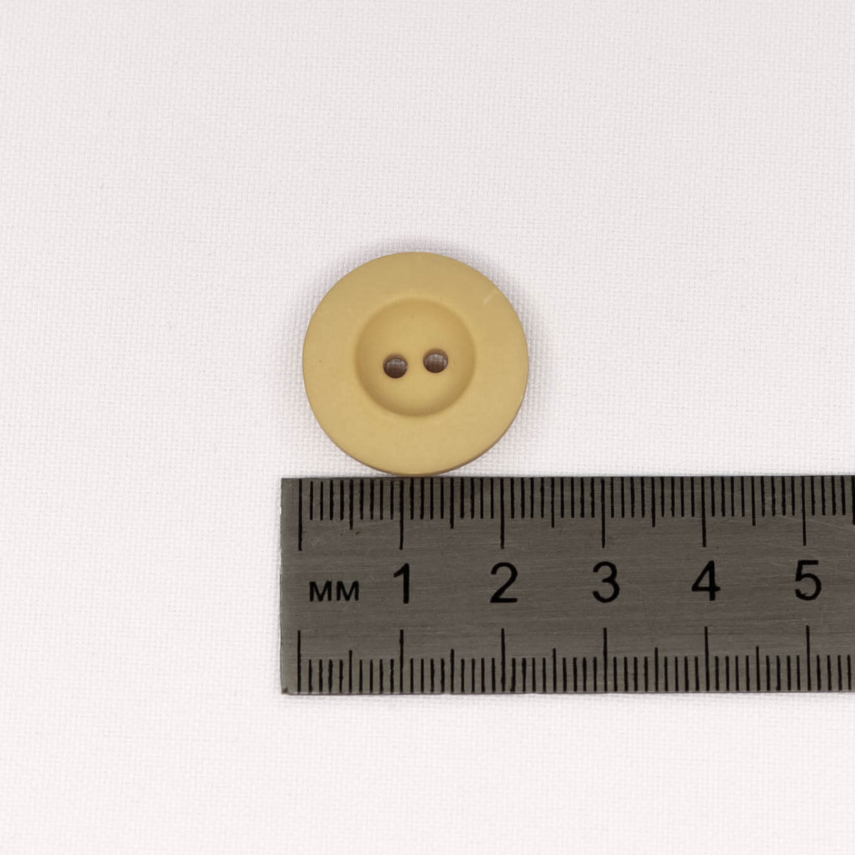 Plastmasas poga Ø23mm - smilšu krāsā