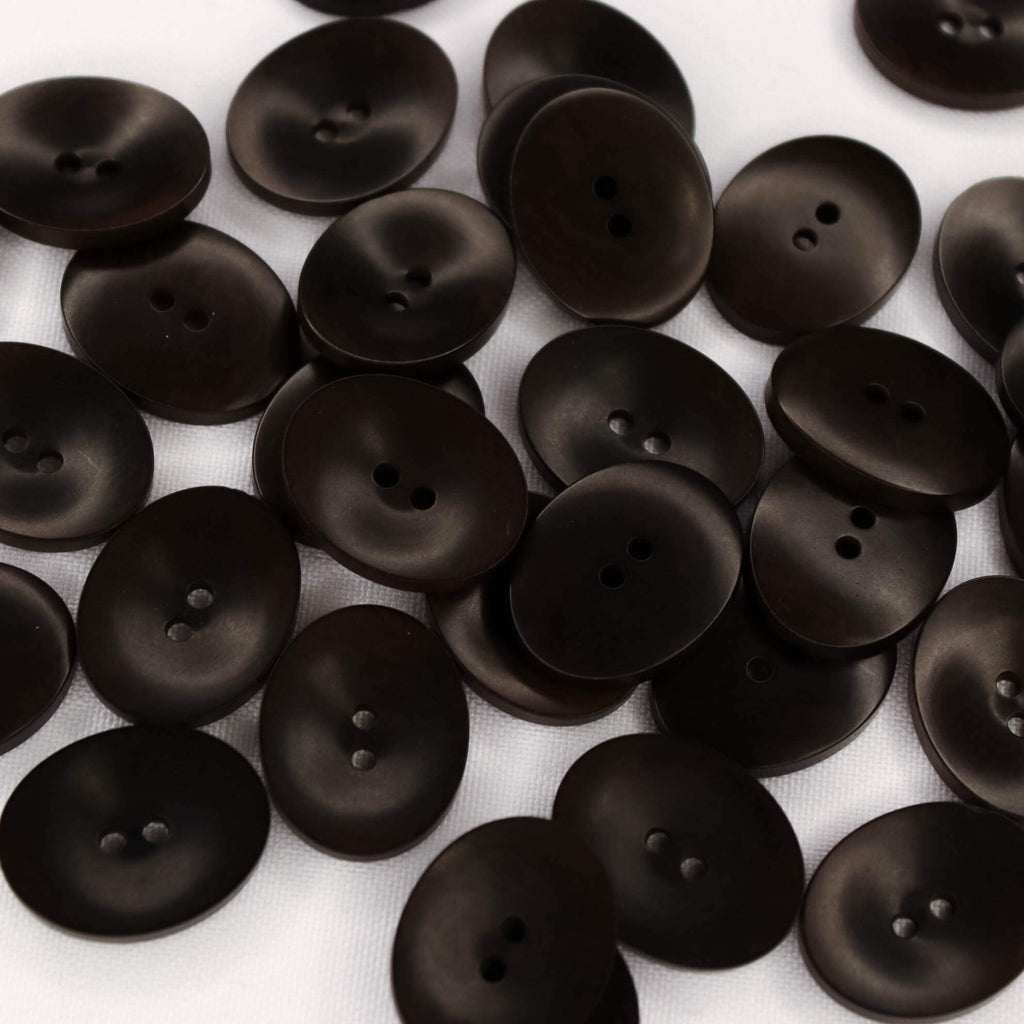 Plastmasas poga 18x23mm - tumši brūna