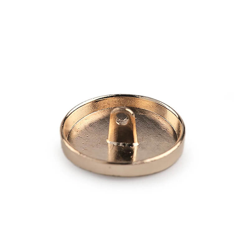 Metal buttons on the leg - gold