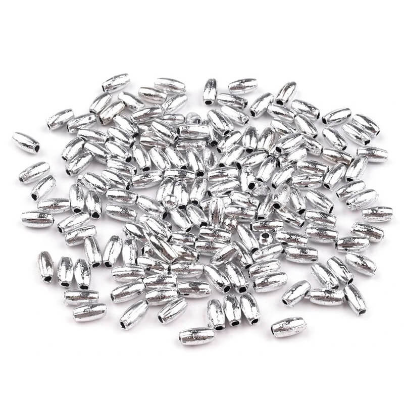 Plastic beads / spacers 3x6mm | 10g - rice